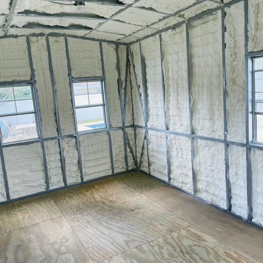 Closed-cell spray foam insulation applied to wall cavities in a residential project in Vermilion